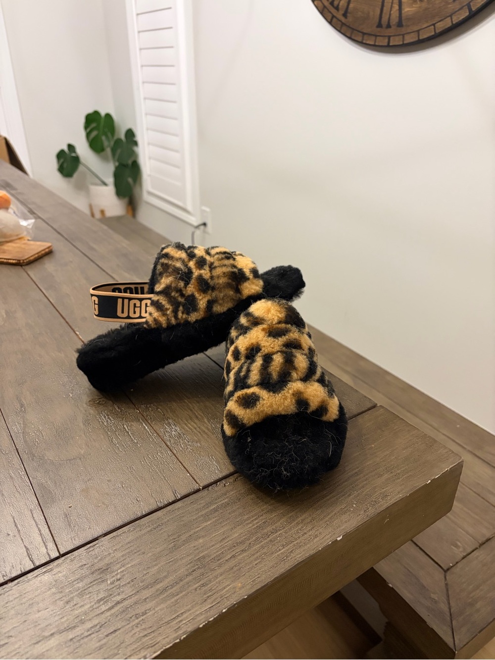 UGG Kids Leopard Fuzz Slide Sandals in Black and Tan